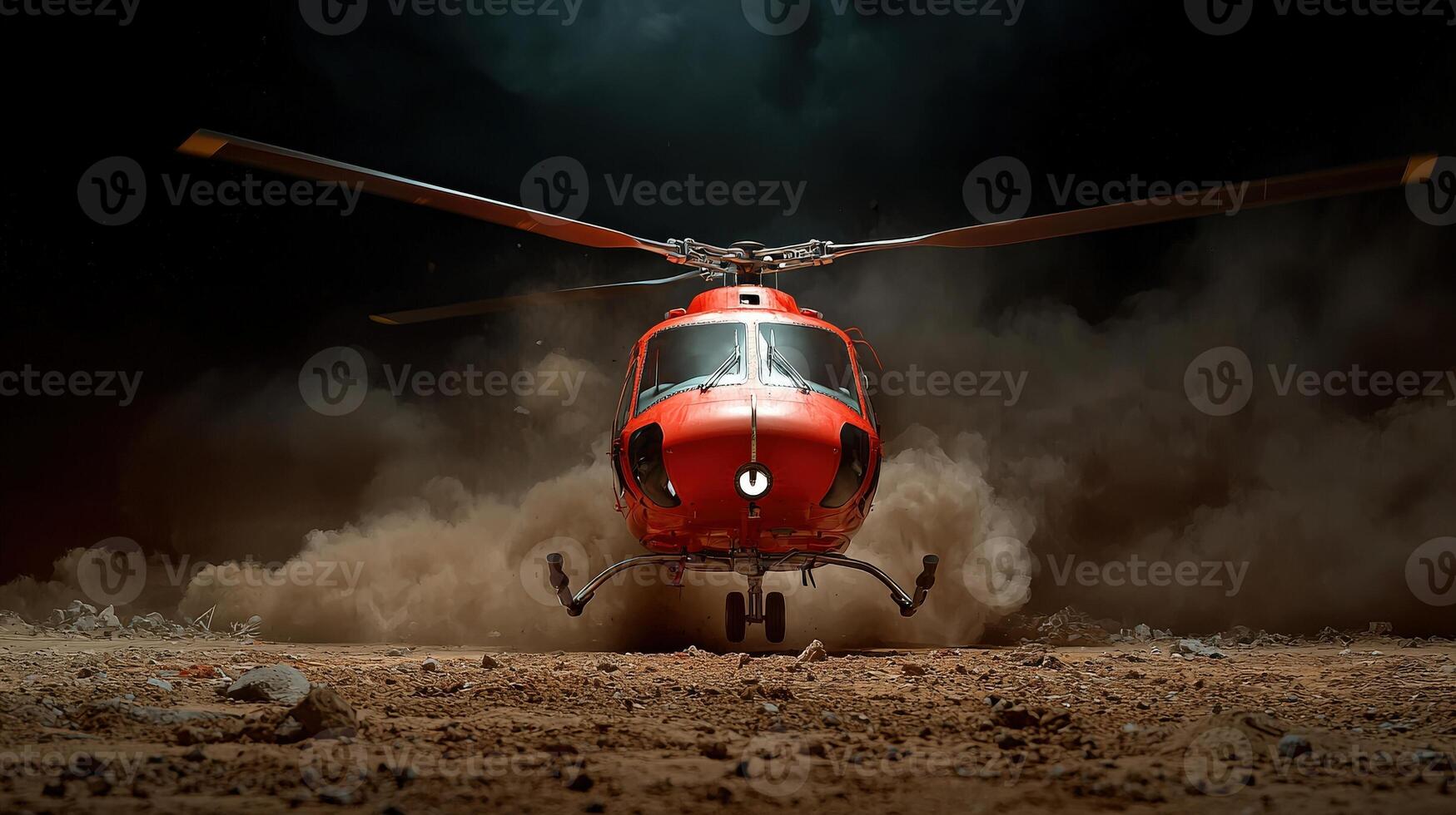 A red helicopter flying through the air at night photo