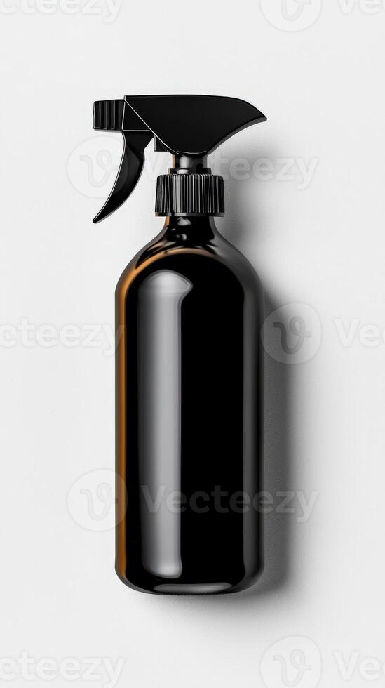 A black spray bottle with a black handle on a white background photo