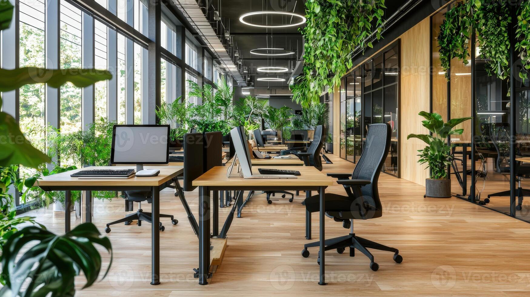 Modern office with plants and desks photo