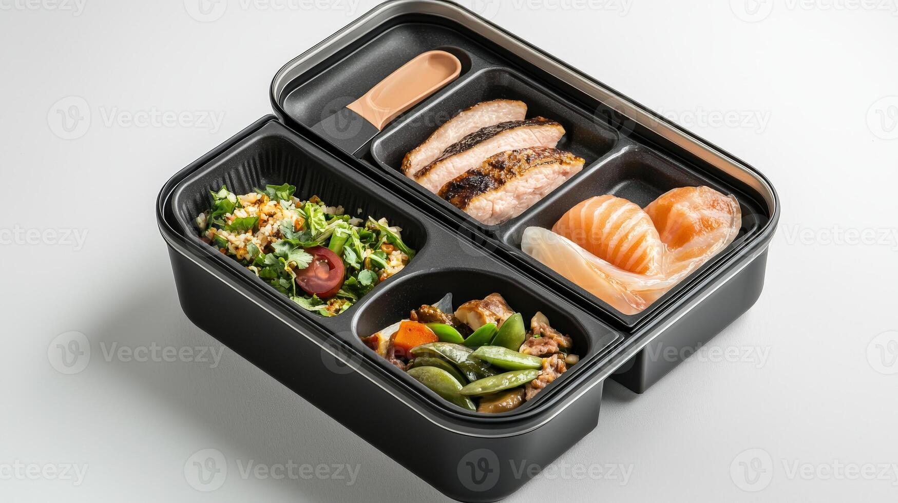 A black lunch box with four compartments photo