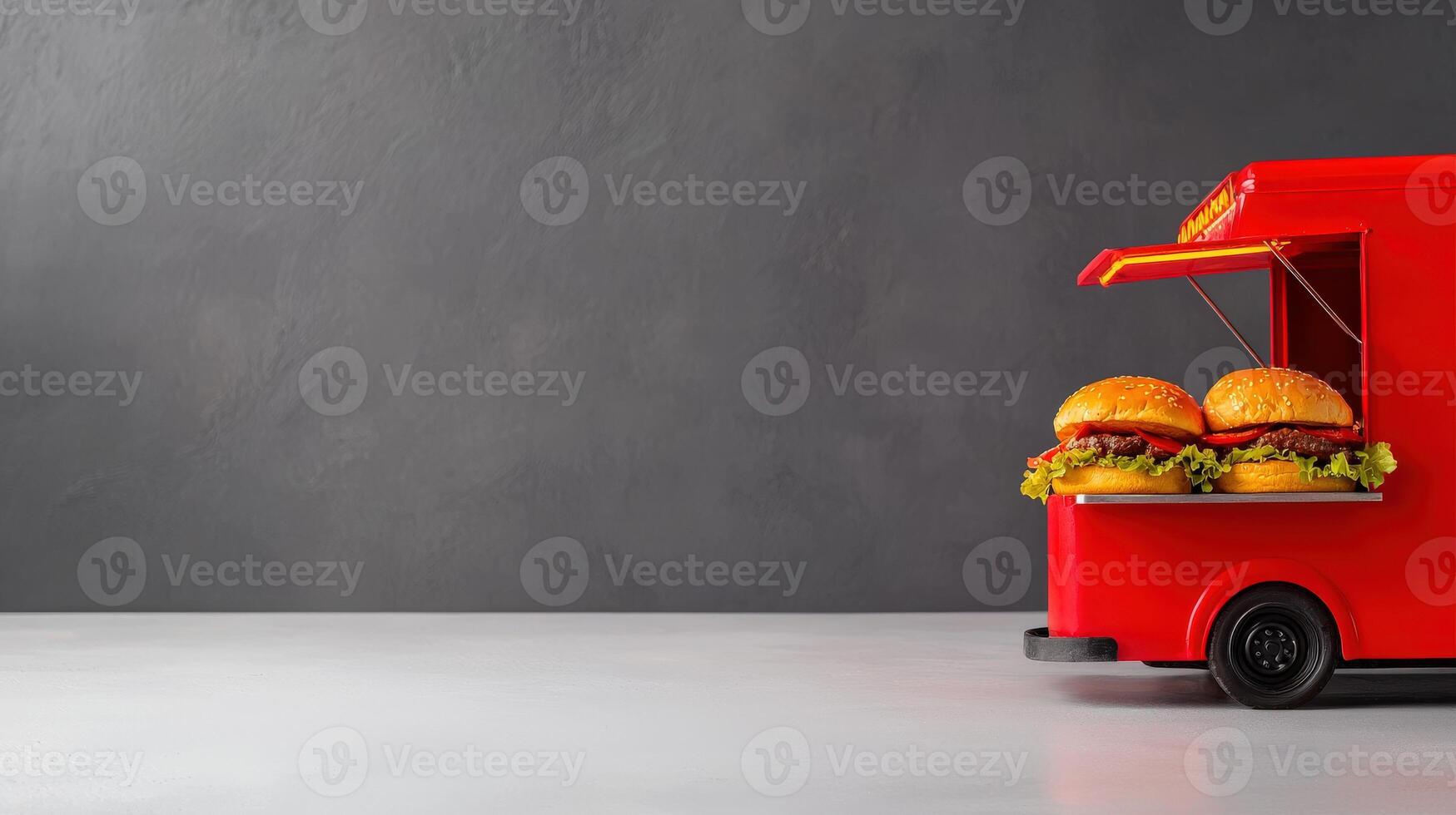 A red food truck with hamburgers on it photo
