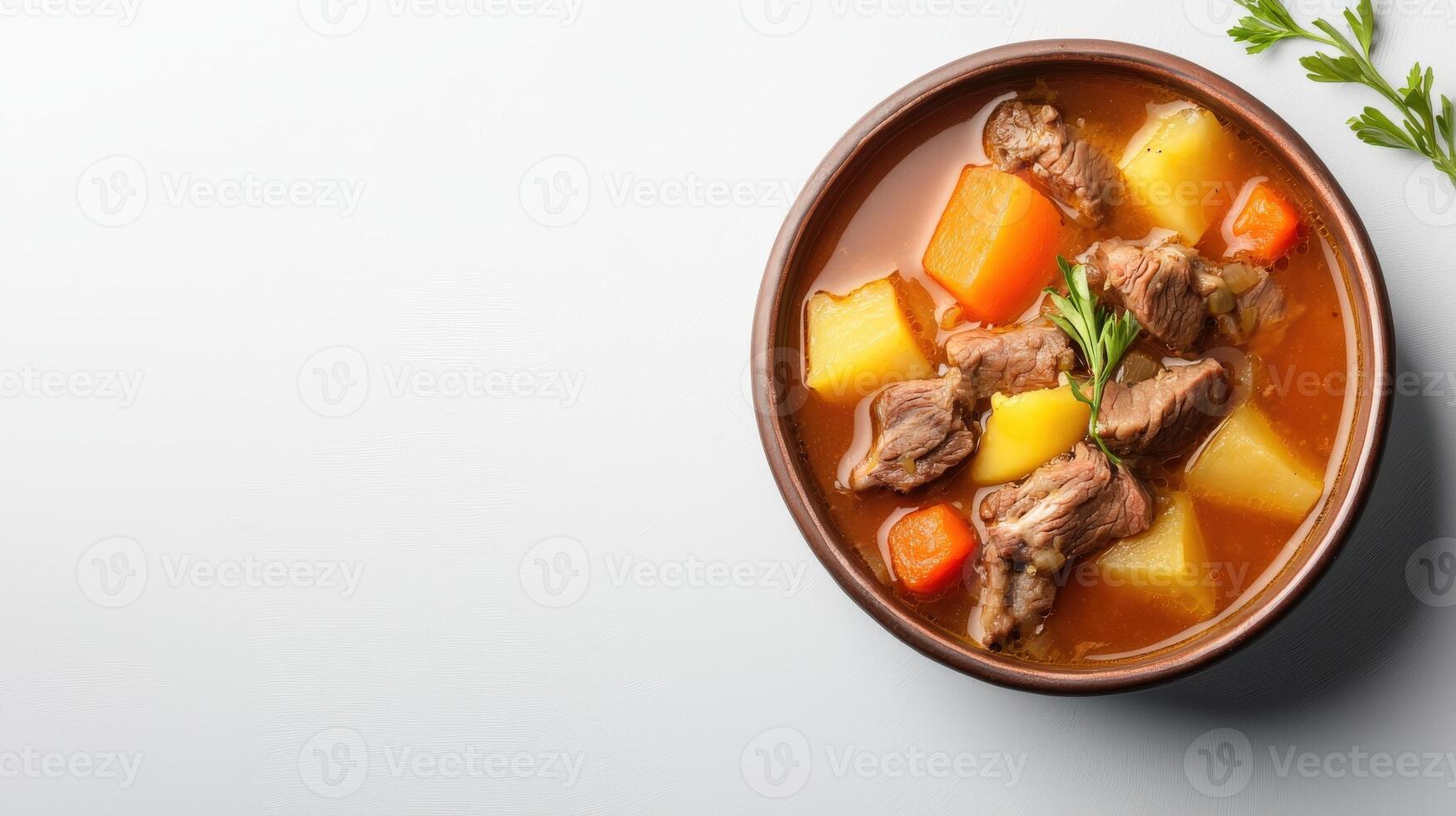 Top view of beef stew in a bowl on a white background photo