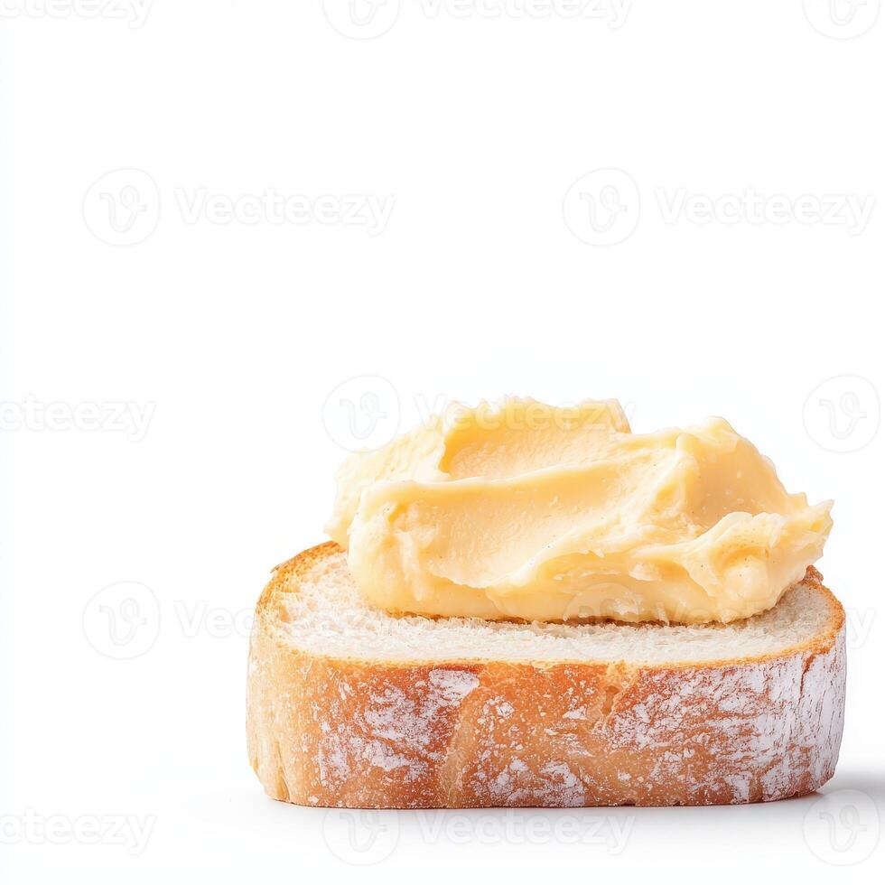 Butter on bread with a white background photo