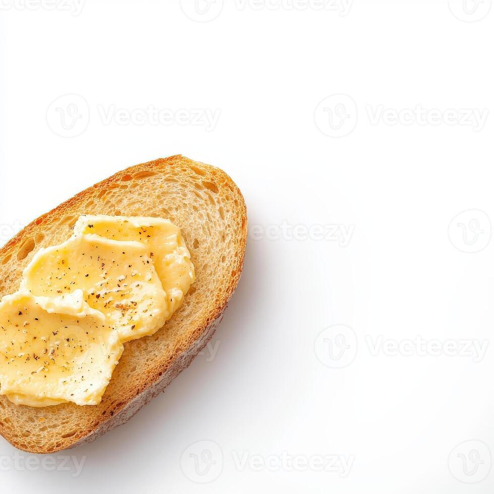 A piece of bread with butter on it photo