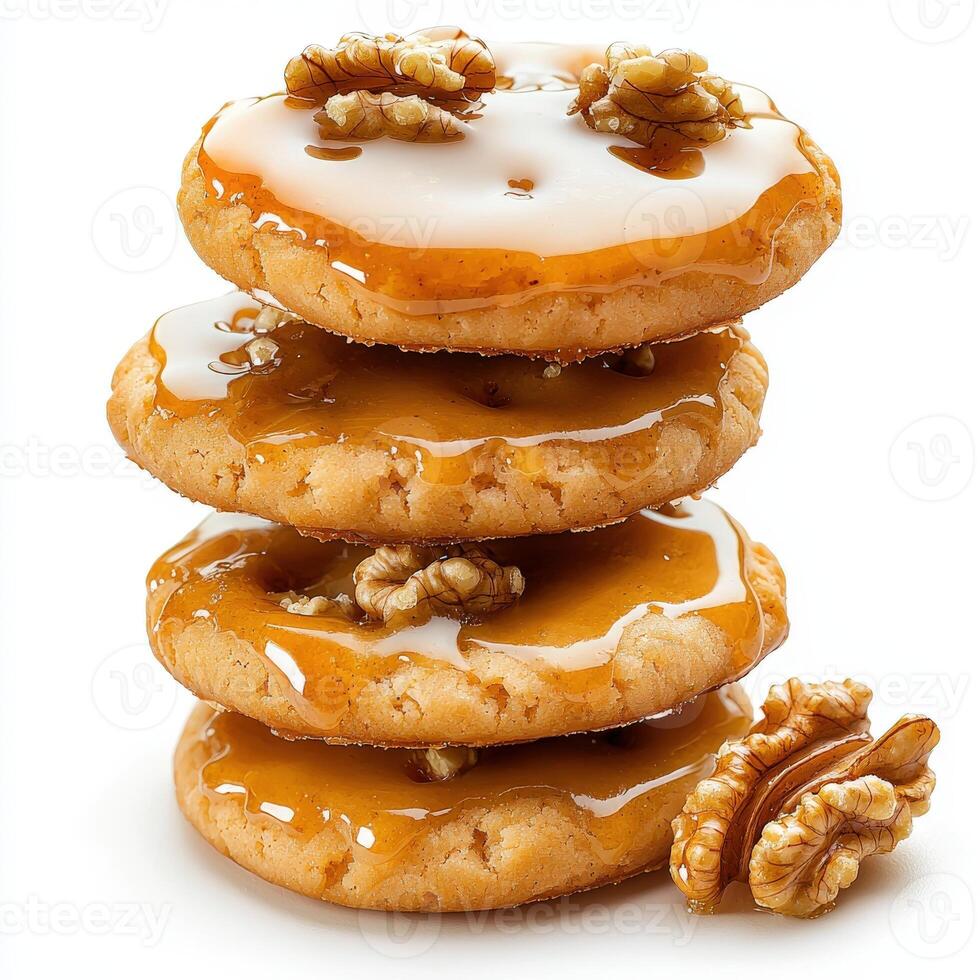 A stack of cookies with caramel and walnuts photo
