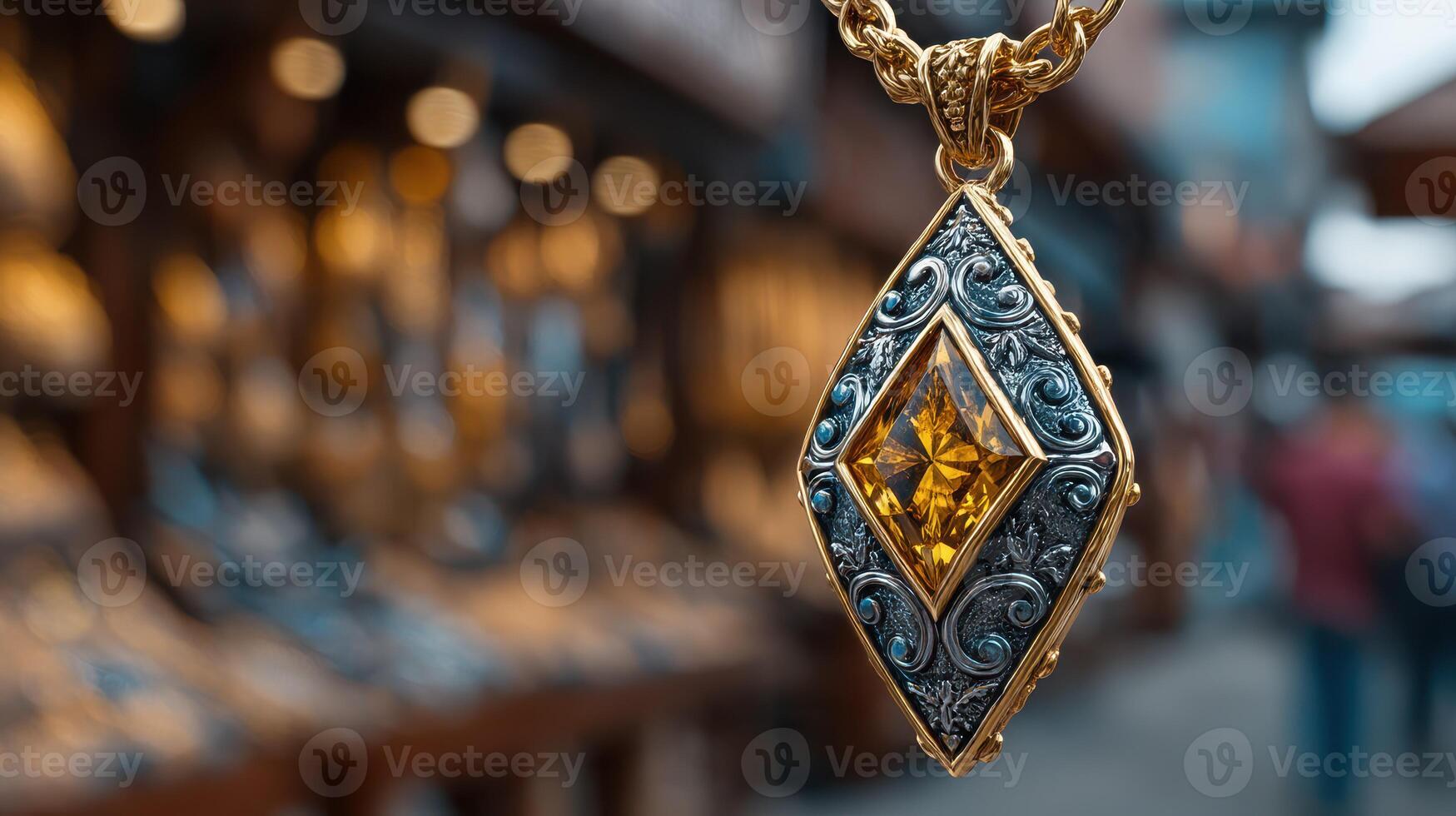 Jewelry pendant featuring intricate design and yellow gemstone displayed at market photo