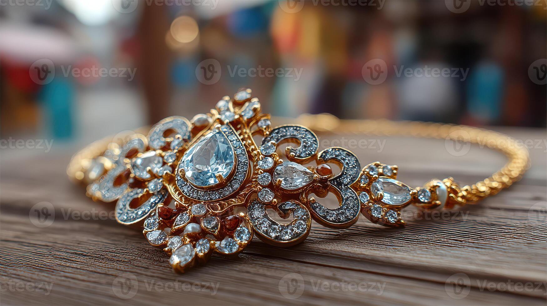 Elaborate golden bracelet adorned with sparkling stones showcased on wooden surface photo