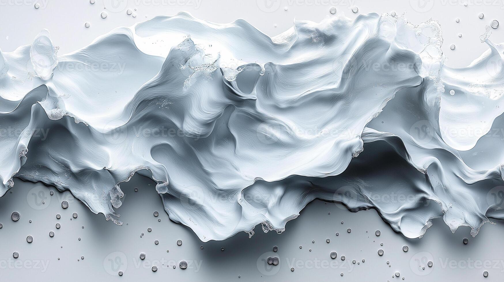A white wave with a lot of foam and water droplets photo