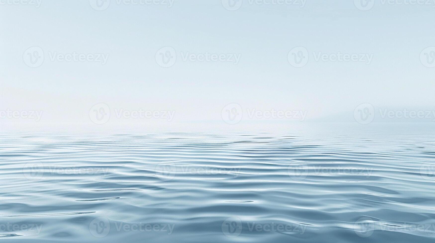 The image is of a calm, still body of water with no visible waves photo