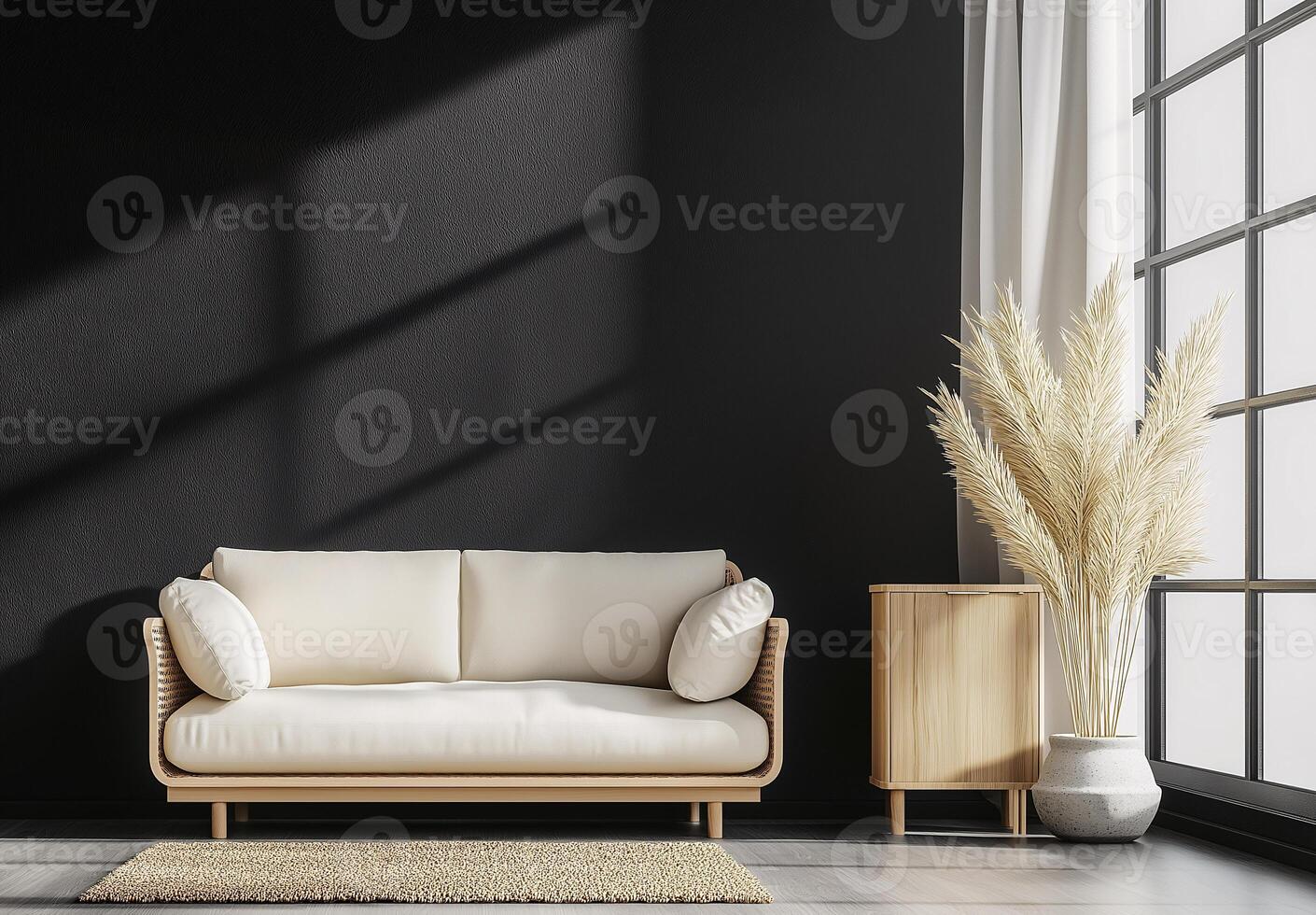A white couch sits in front of a window with a potted plant in the corner photo