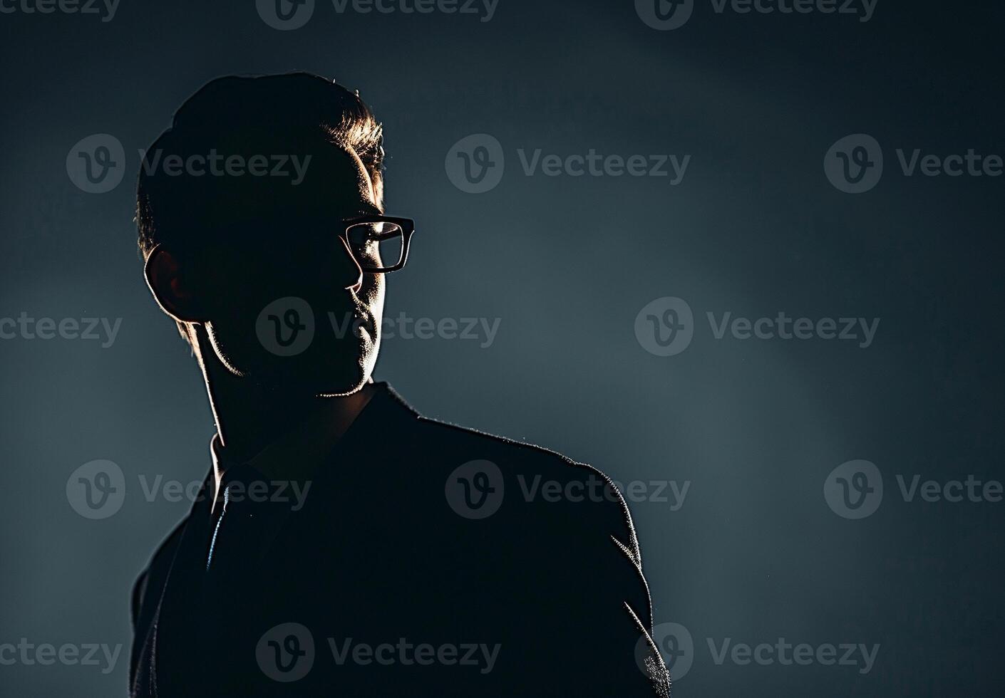 A Shadowy Figure Gazes Into the Darkness photo