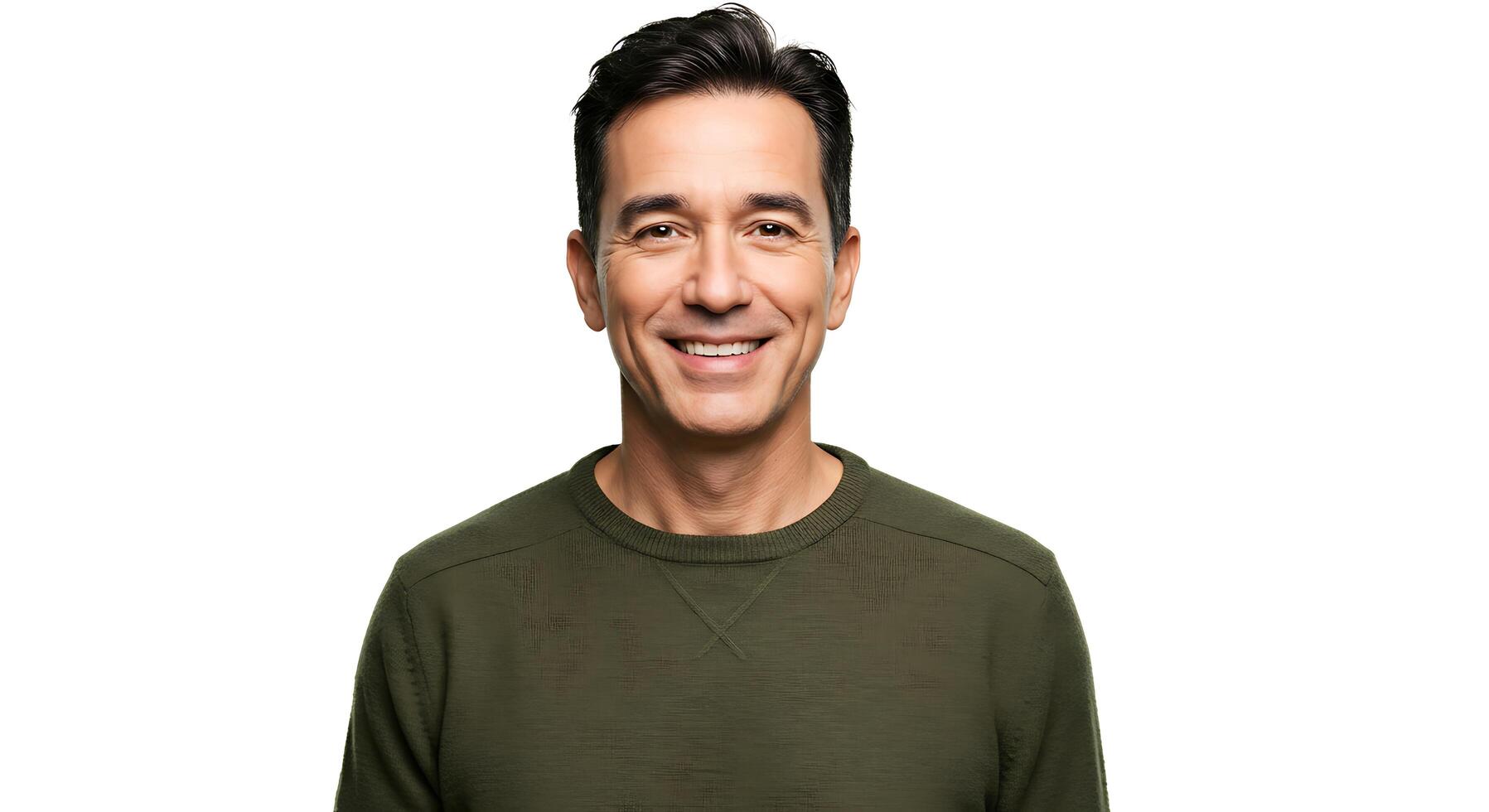 A man in a green sweater smiling photo