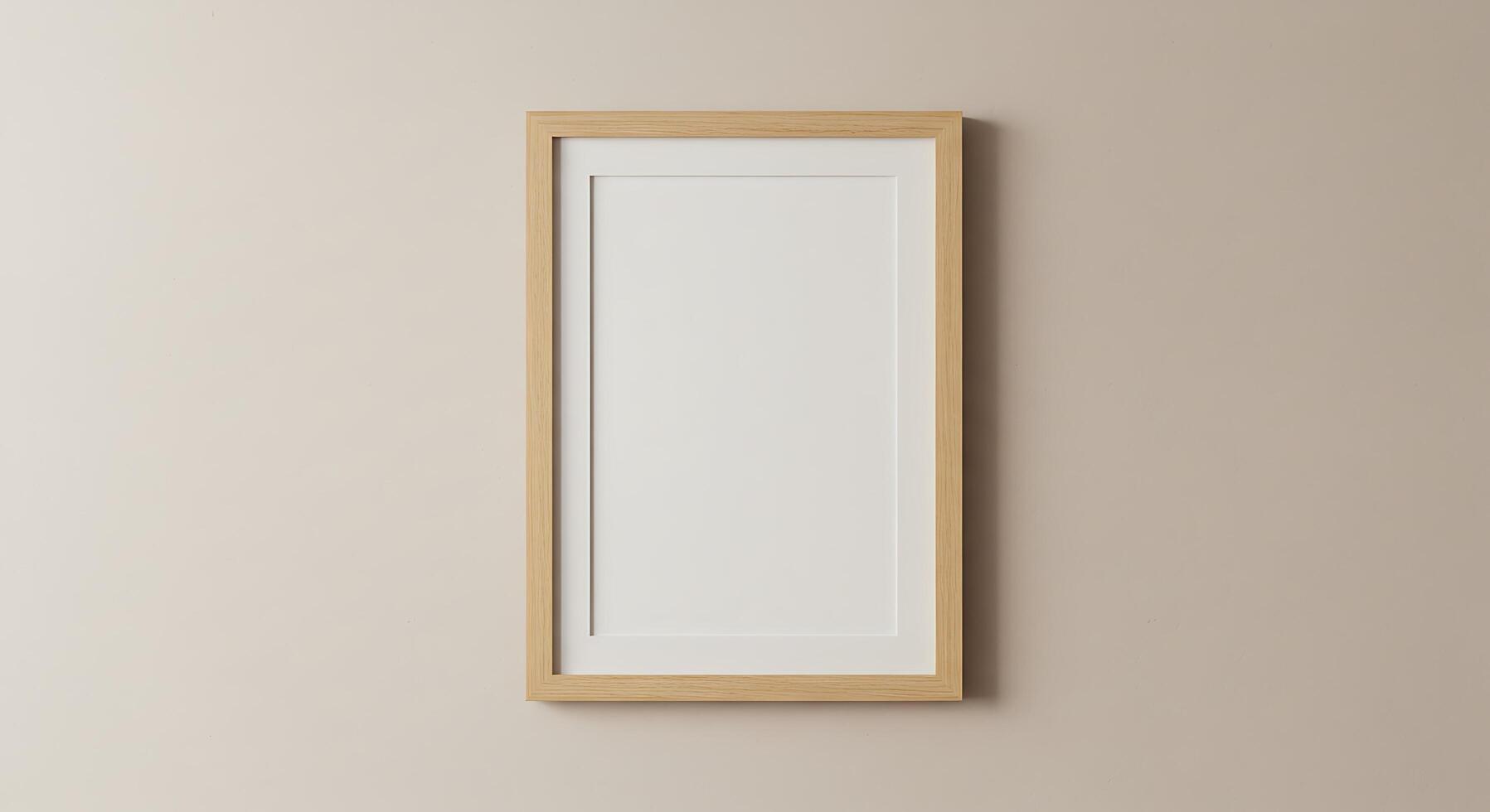 A blank white frame hanging on a wall photo