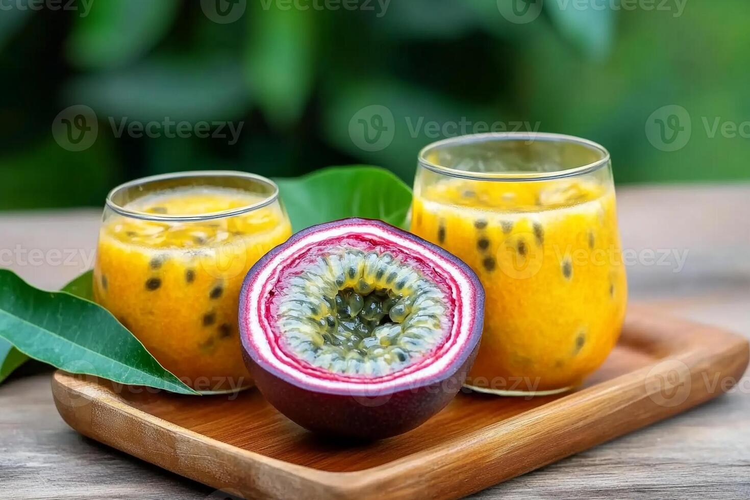 Passion fruit juice on wooden tray photo