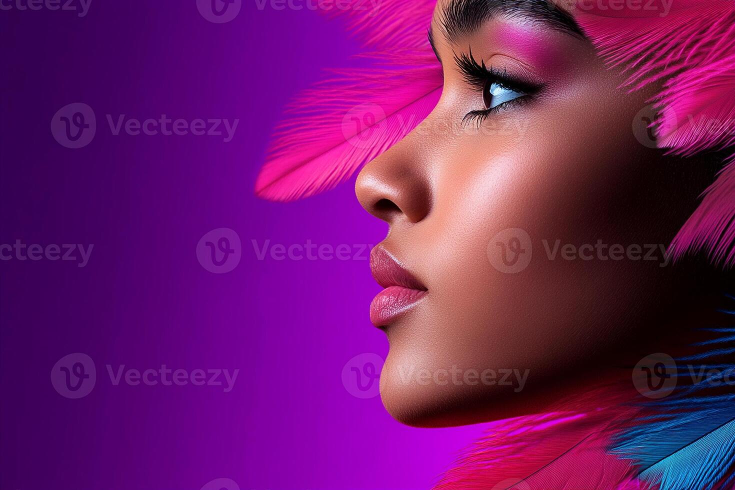 Beautiful african woman with colorful feathers on her head photo