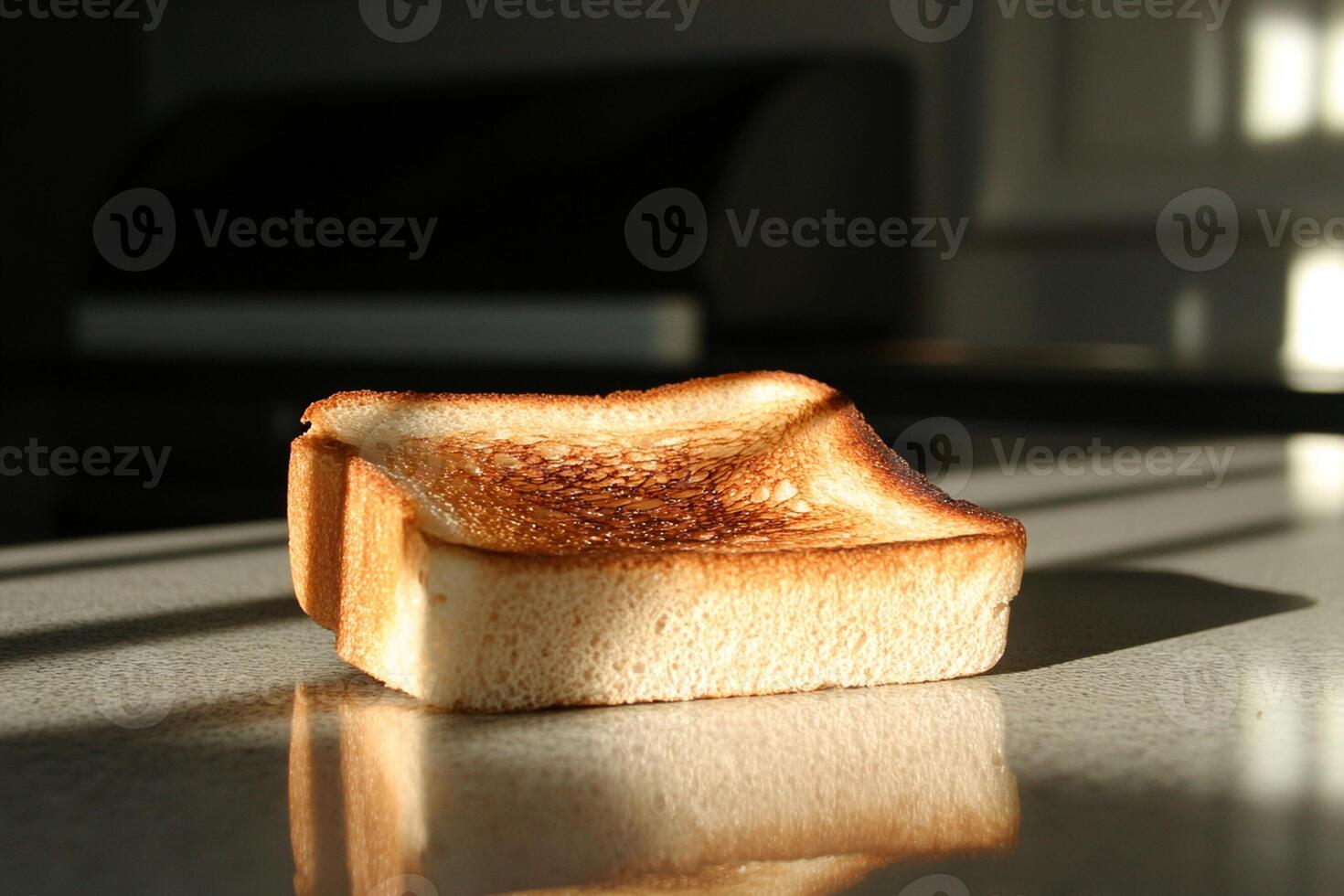 A piece of toast sitting on a counter photo