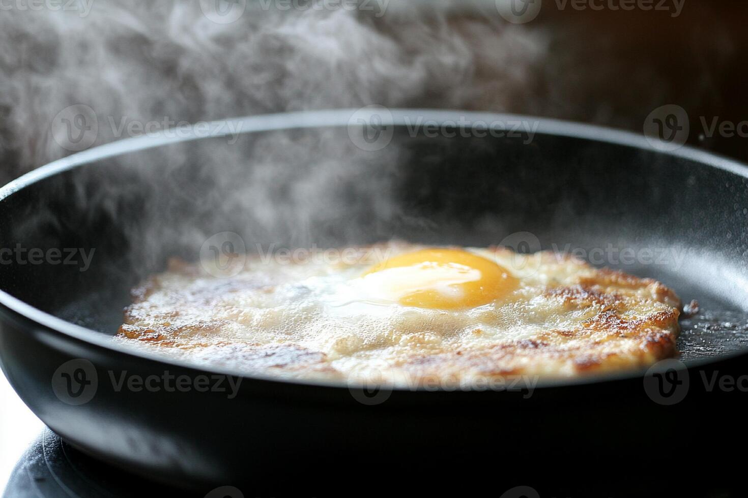 A frying pan with an egg in it photo