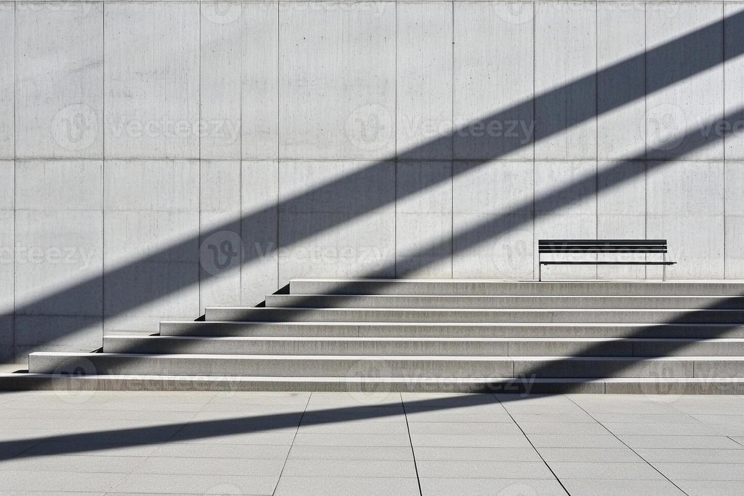 A bench is sitting on the steps of a building photo