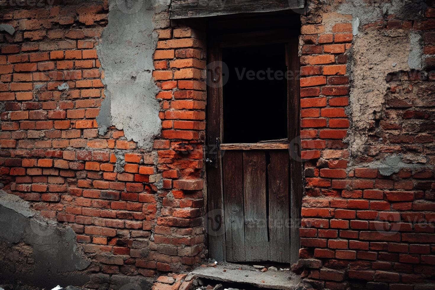 A door is open on a brick wall photo