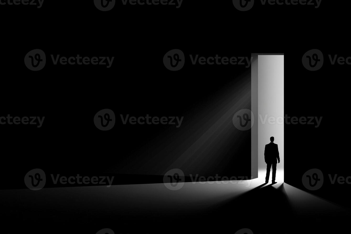 A man standing in front of an open door photo