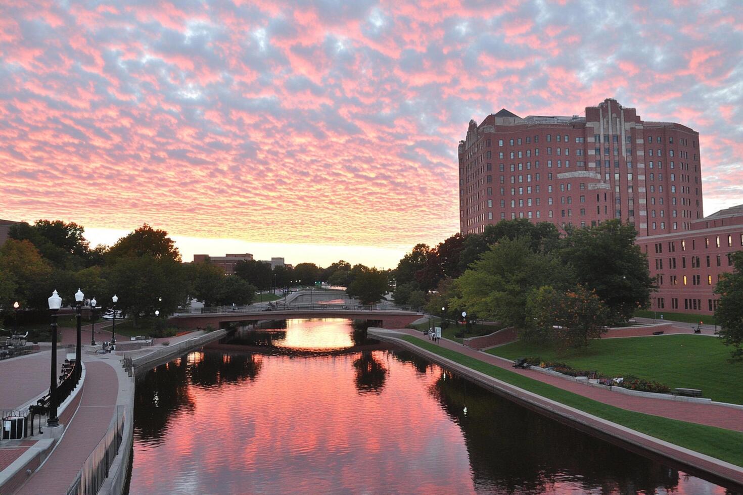 A river with a bridge and buildings in the background photo