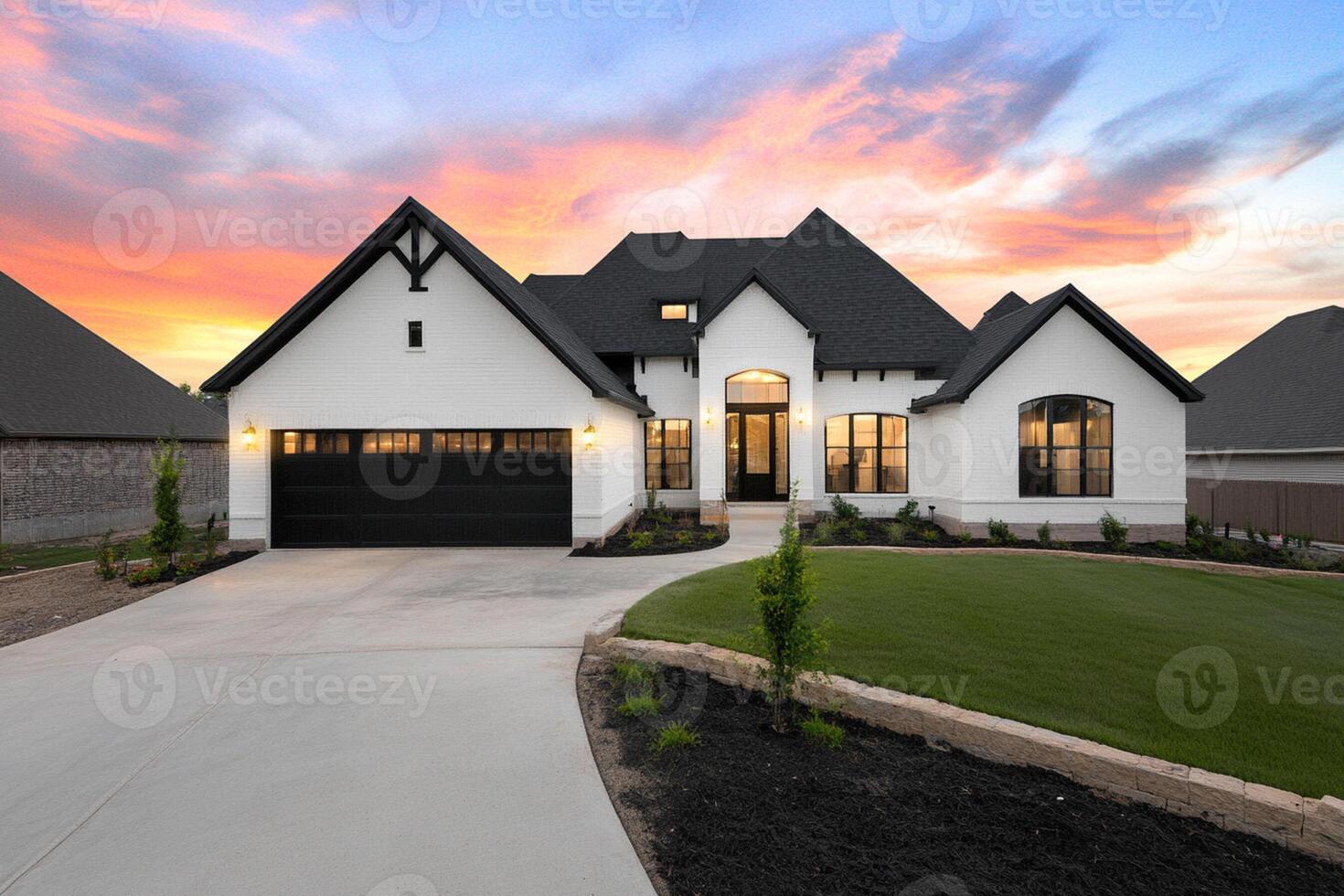 A beautiful home with a beautiful sunset photo