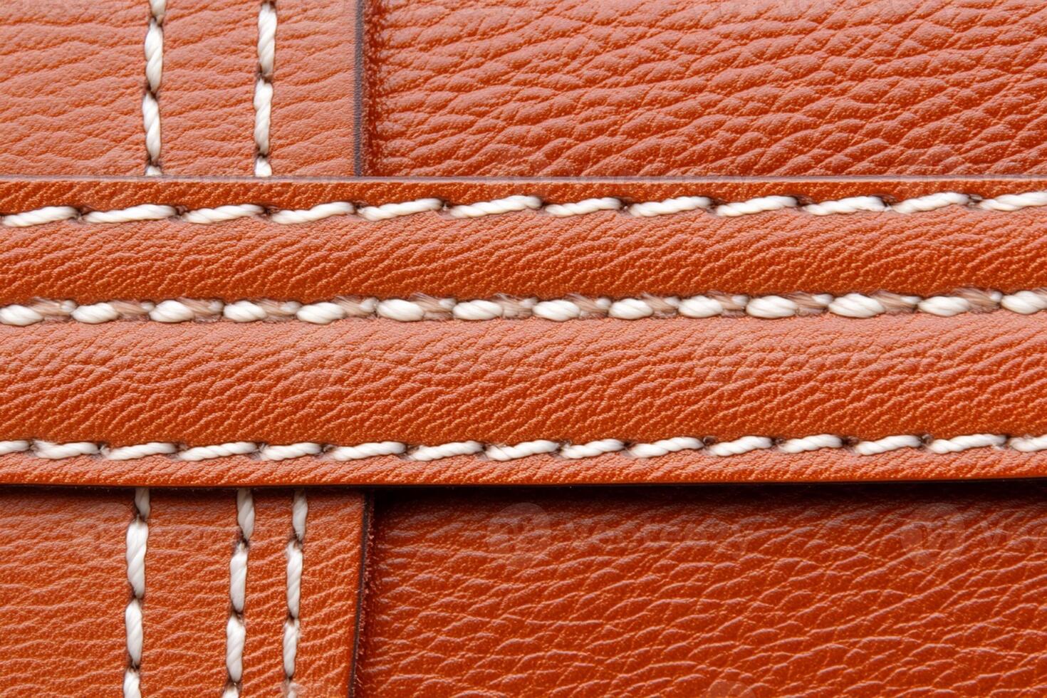 Closeup of a leather bag with stitching photo