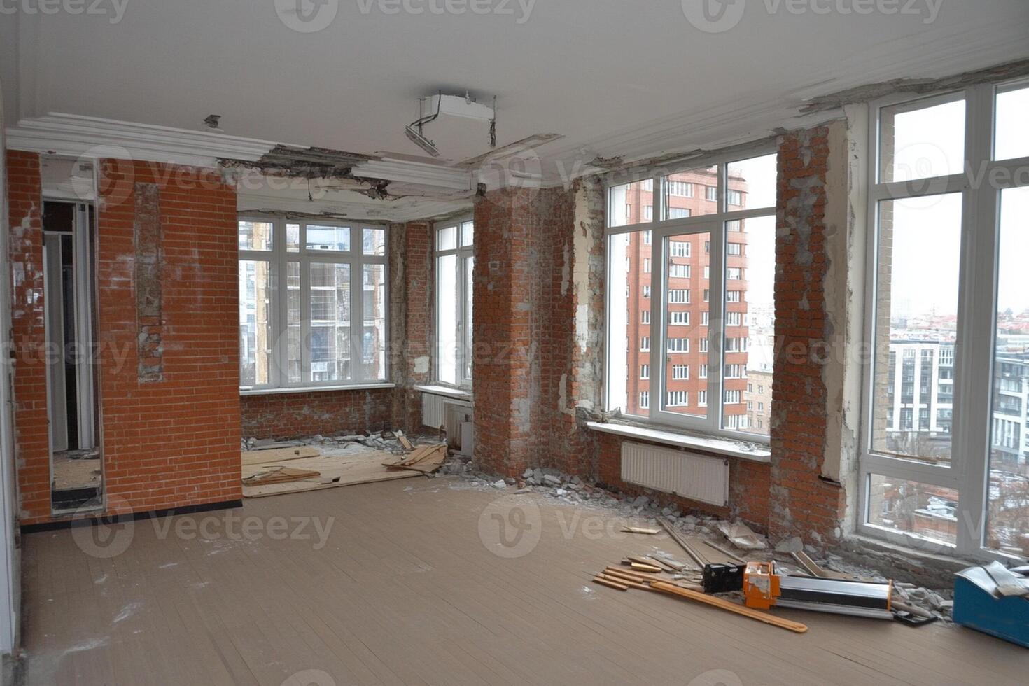 A room with a lot of windows and a lot of brick photo