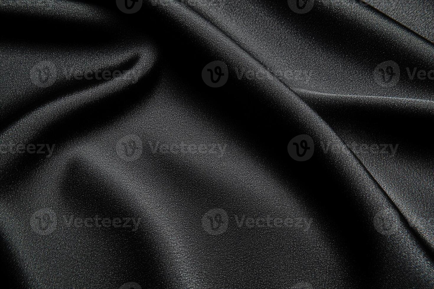 Black silk fabric with folds photo