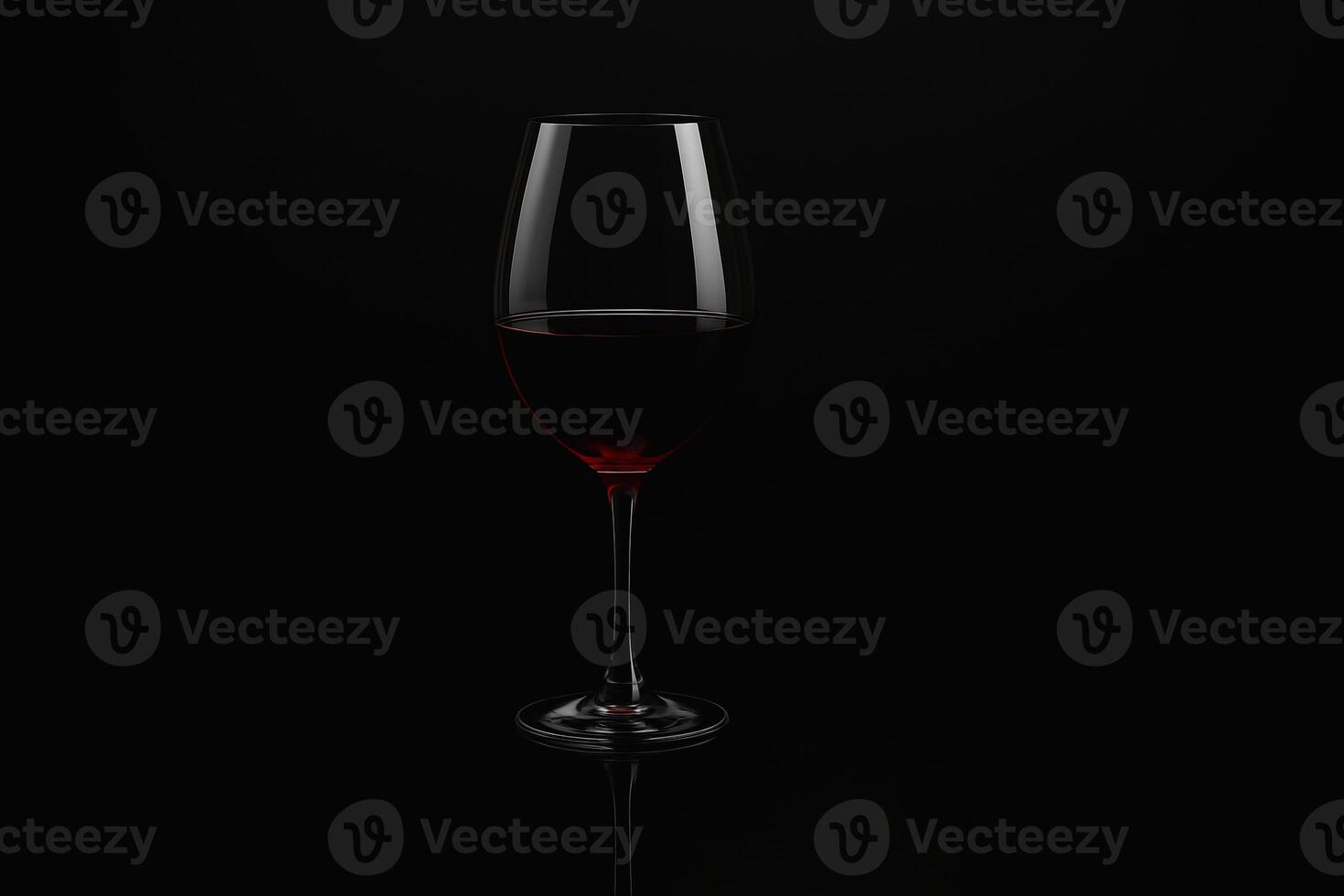 Glass of Red Wine on Black Background with Elegant Lighting photo
