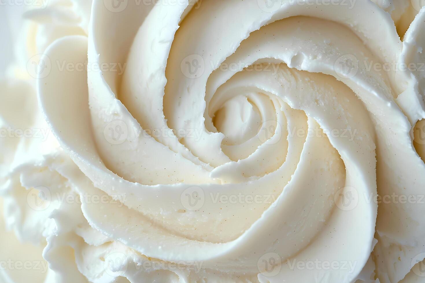 Delicious creamy white buttercream frosting swirls in a perfect spiral shape photo
