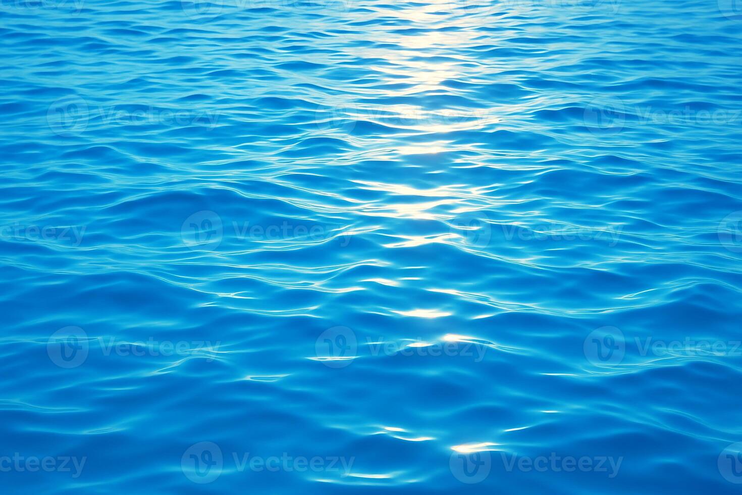 blue ocean background with sun shining through the water photo