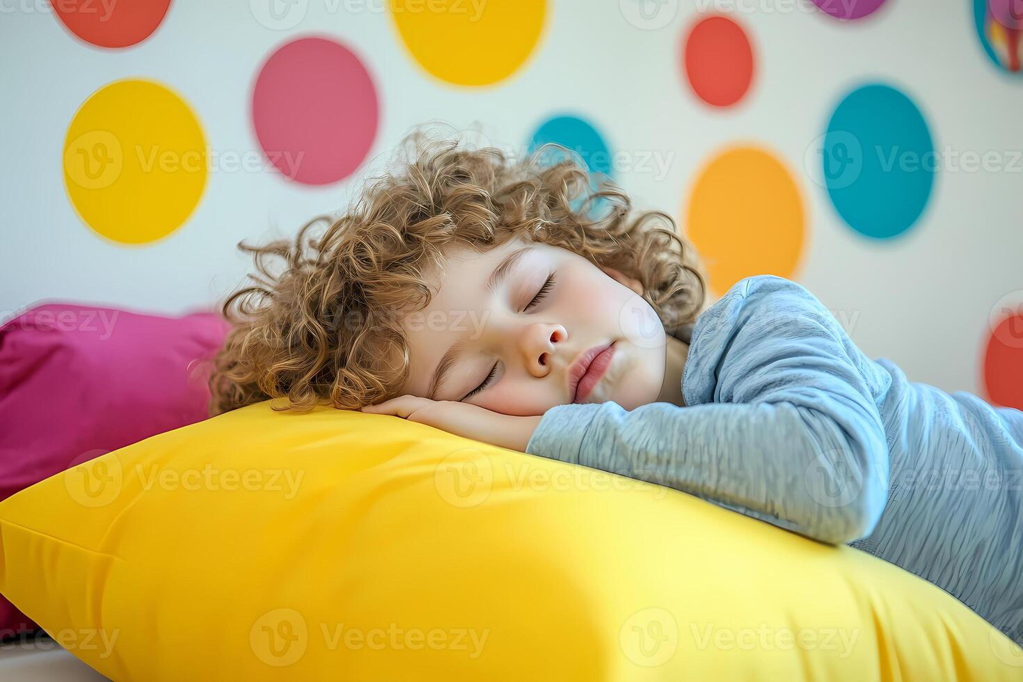 Serene child sleeping peacefully on yellow pillow in colorful room photo