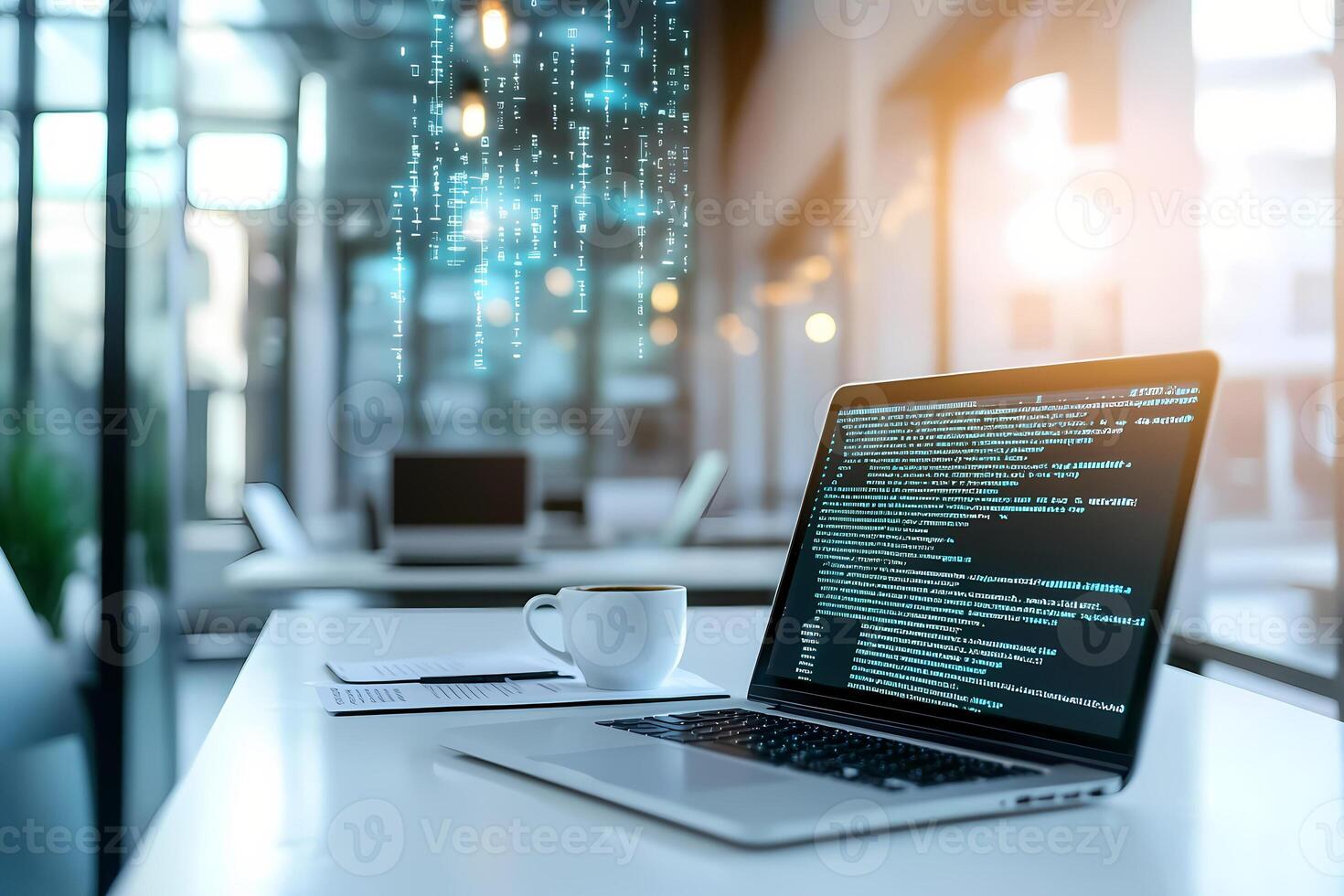 Modern workplace showing programming code on laptop screen with falling digital rain photo