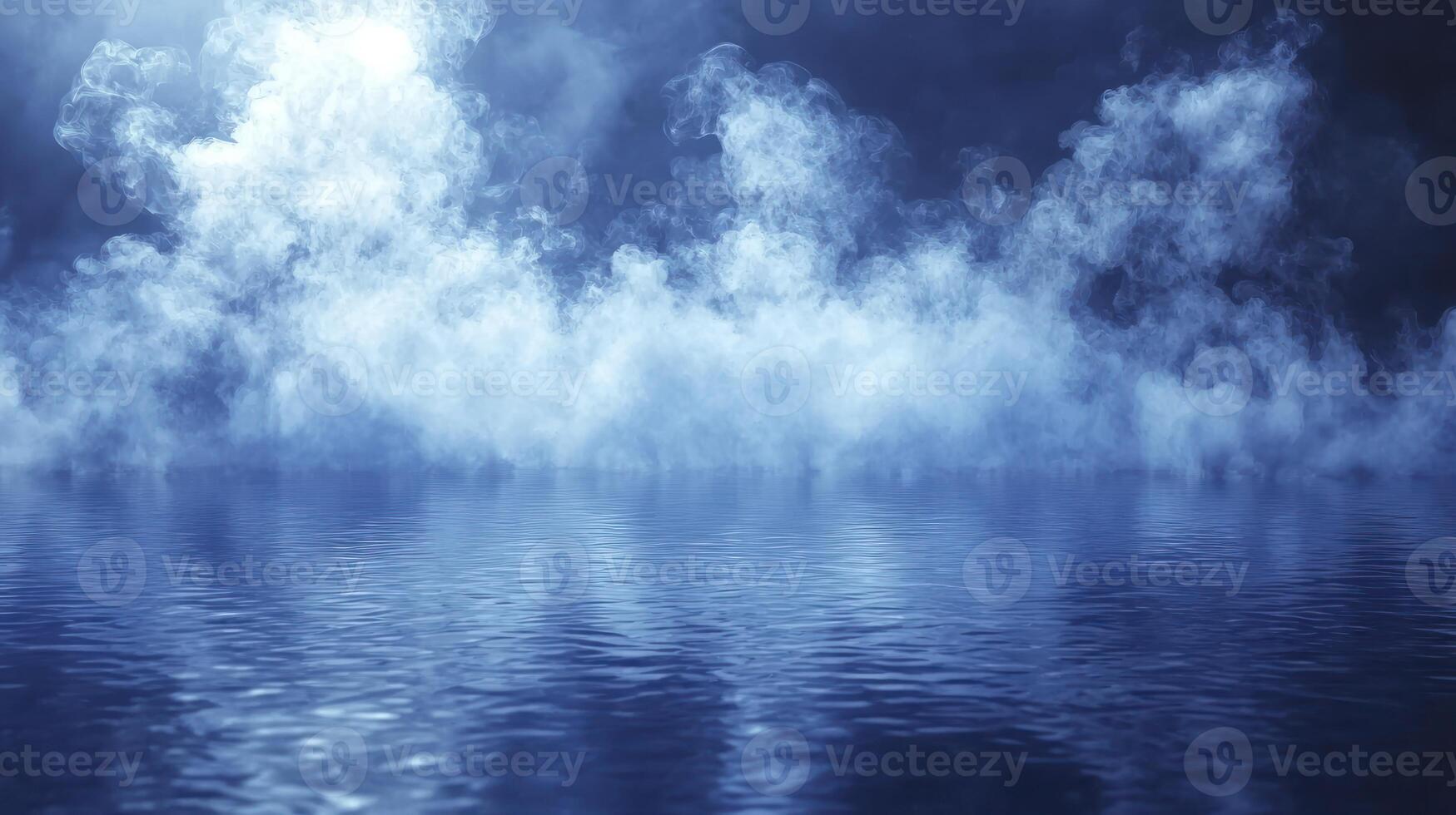 A blue sky with smoke coming out of the water photo