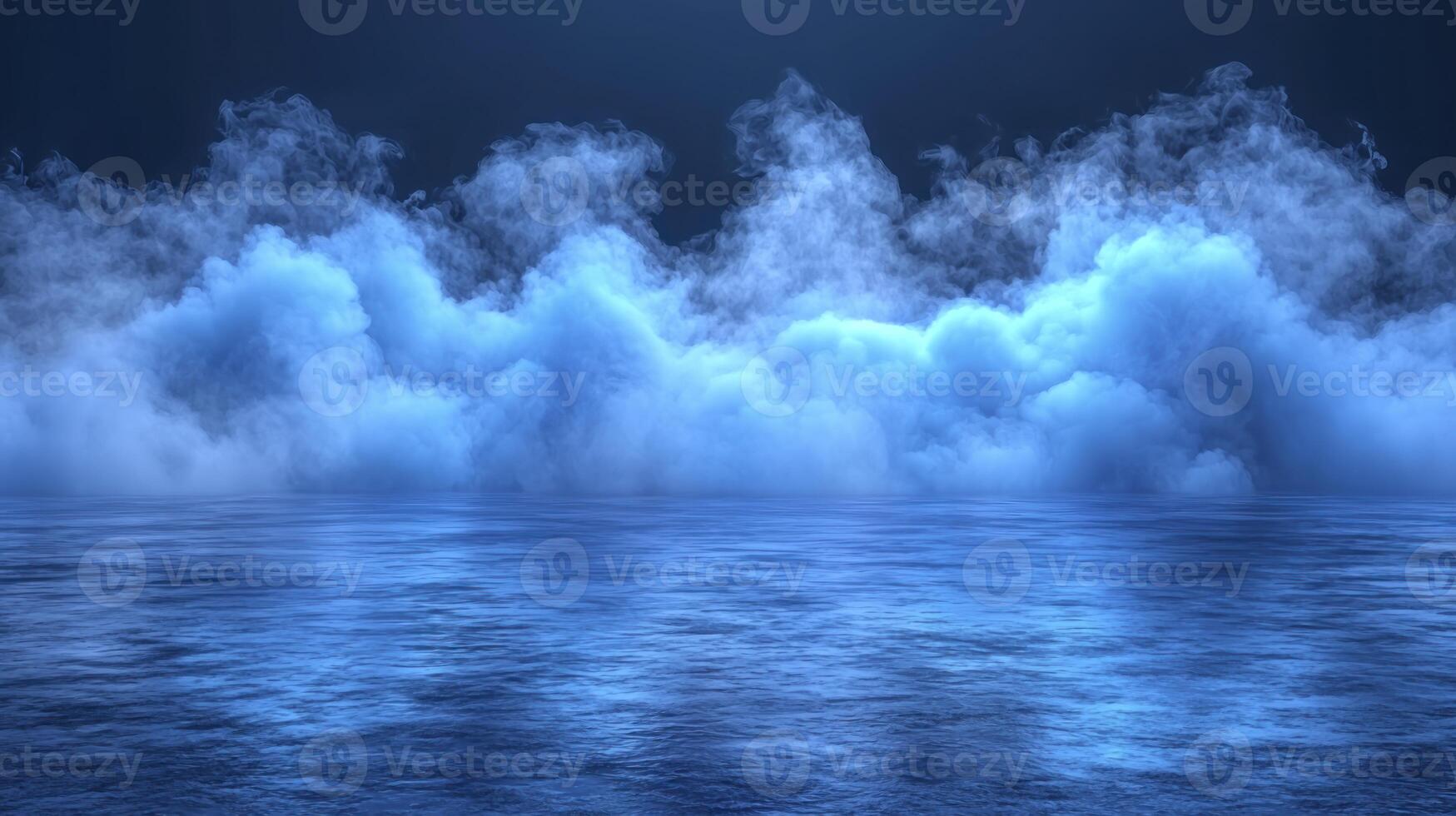 A blue ocean with some clouds in the sky photo