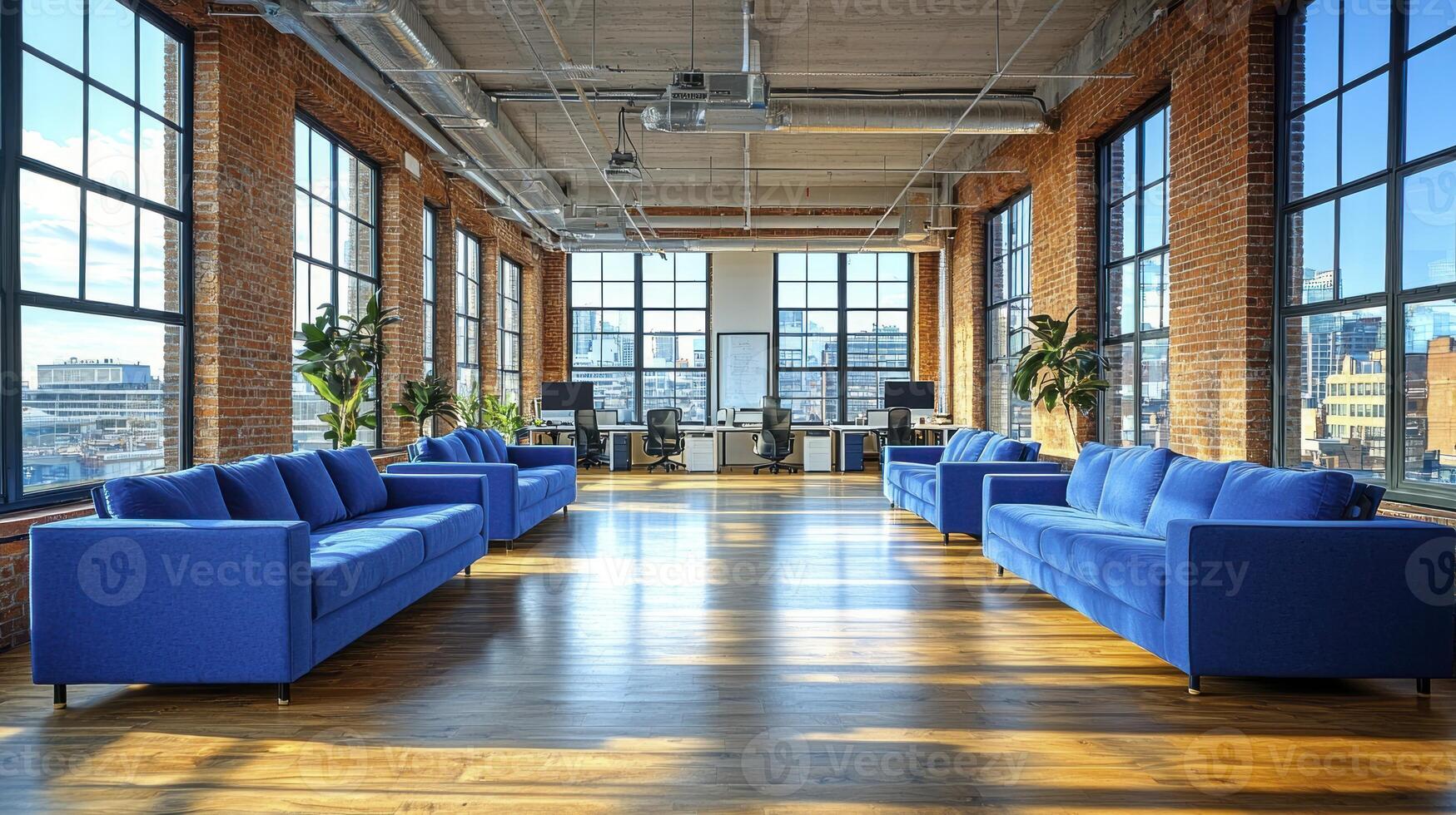 An office with blue couches and windows photo