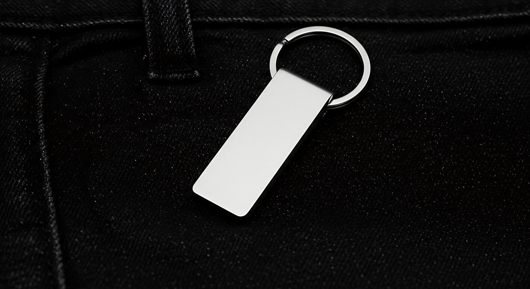 A keychain with a metal rectangle on it photo