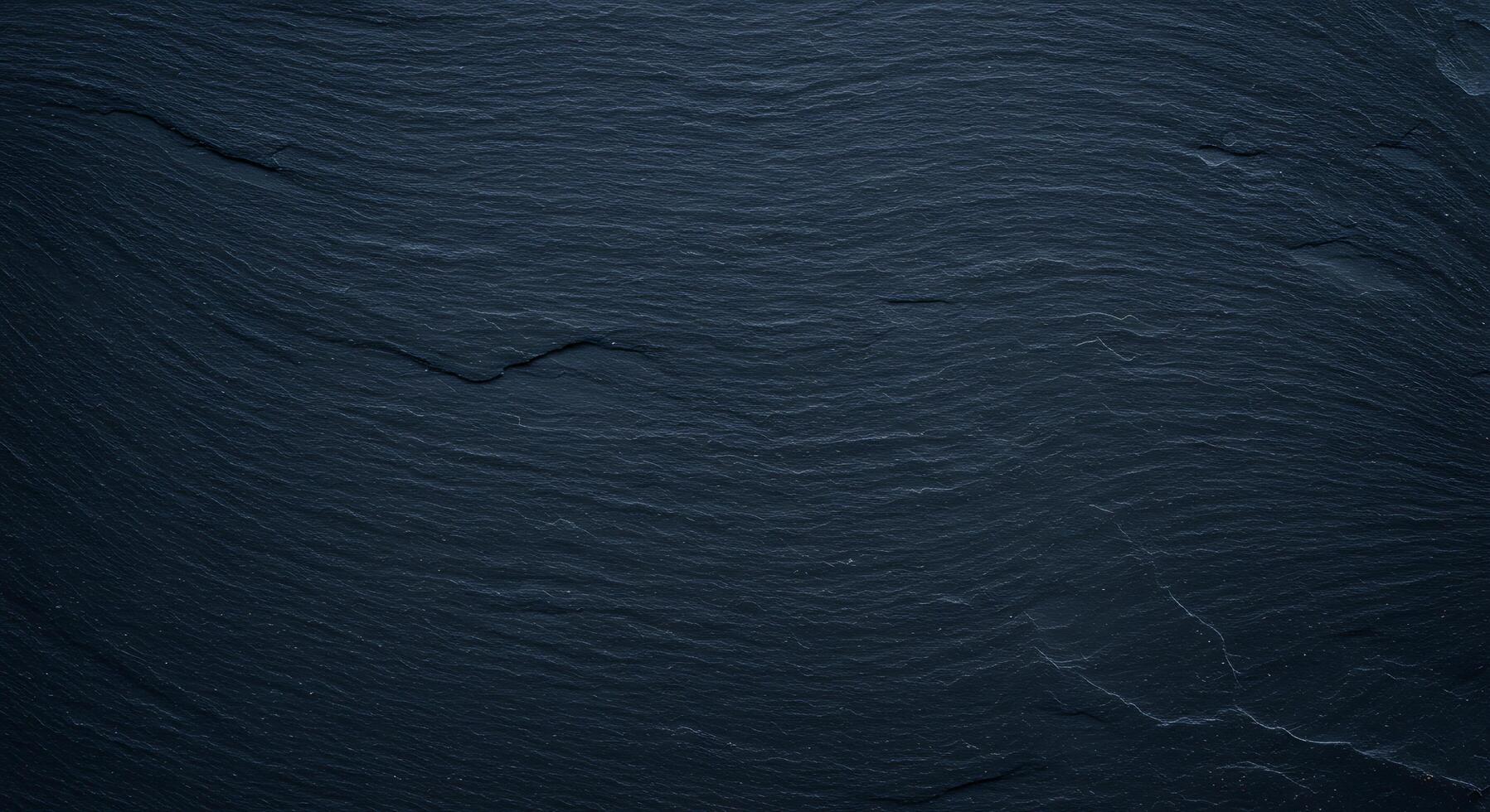 A dark blue background with waves and dark lines photo