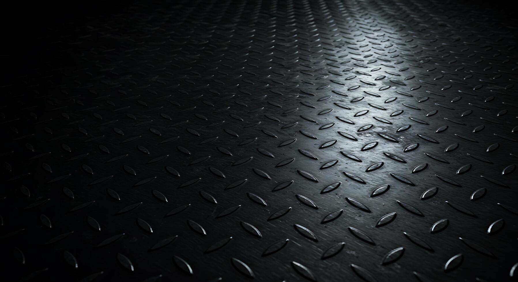 A black diamond plate background with a shiny surface photo