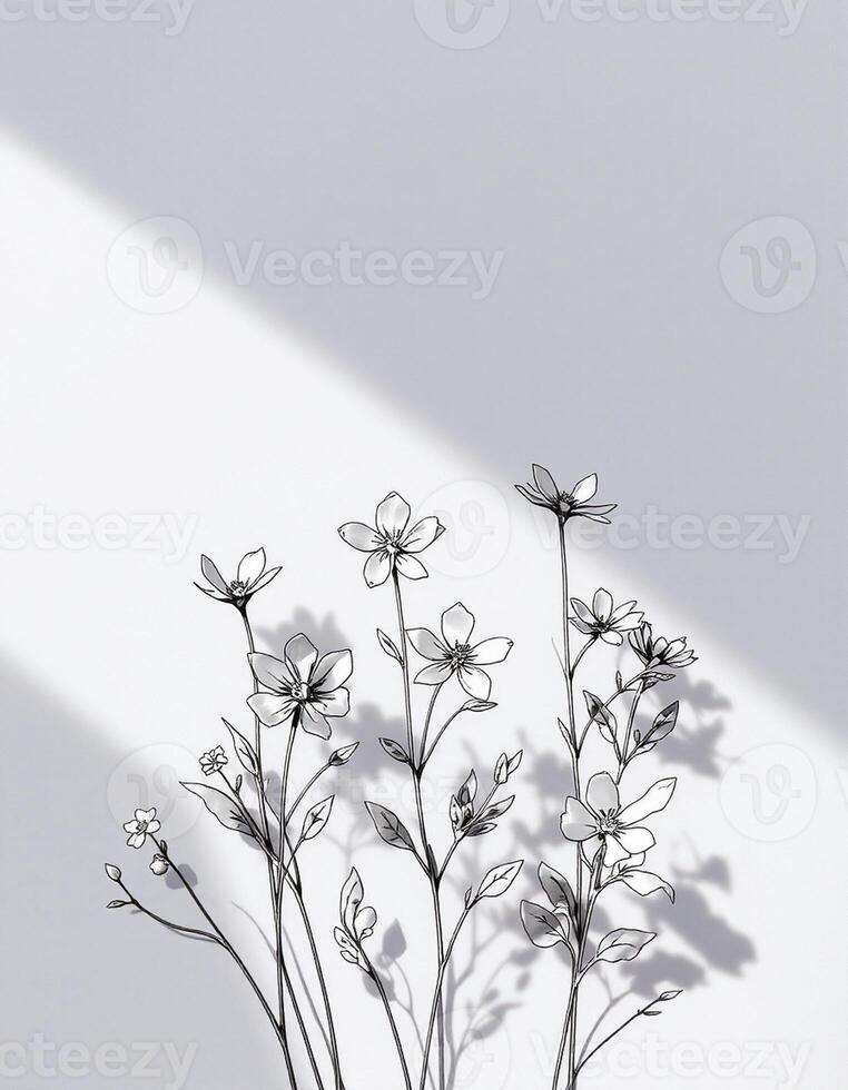 A black and white photo of flowers on a table