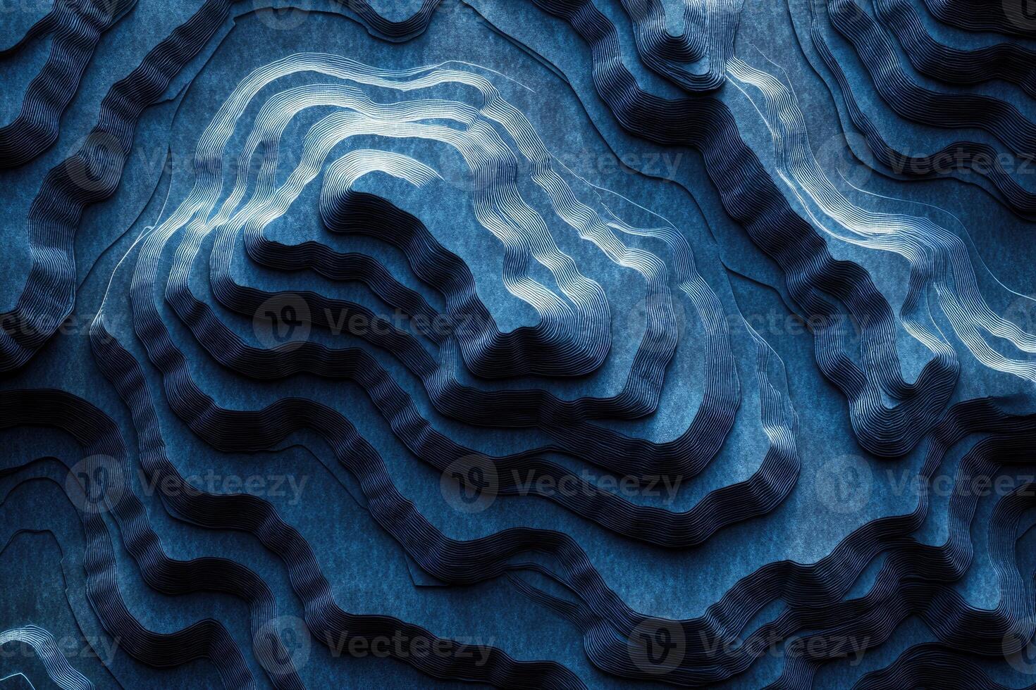 Detailed sculpted relief of undulating blue mountains. photo