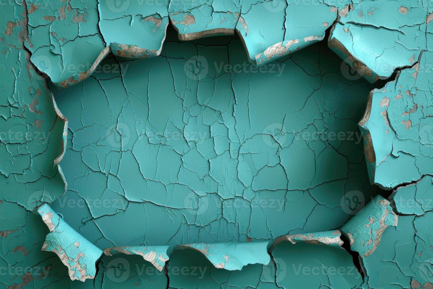 Teal painted surface with a torn-out hole. photo