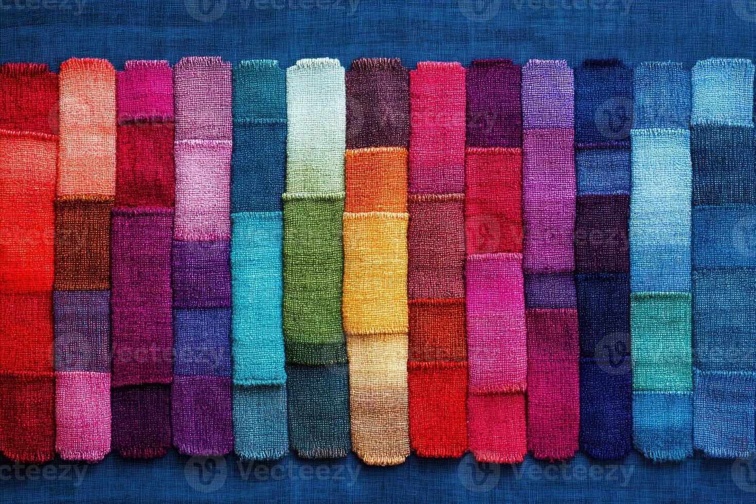 Colorful knitted swatches arranged in a spectrum. photo