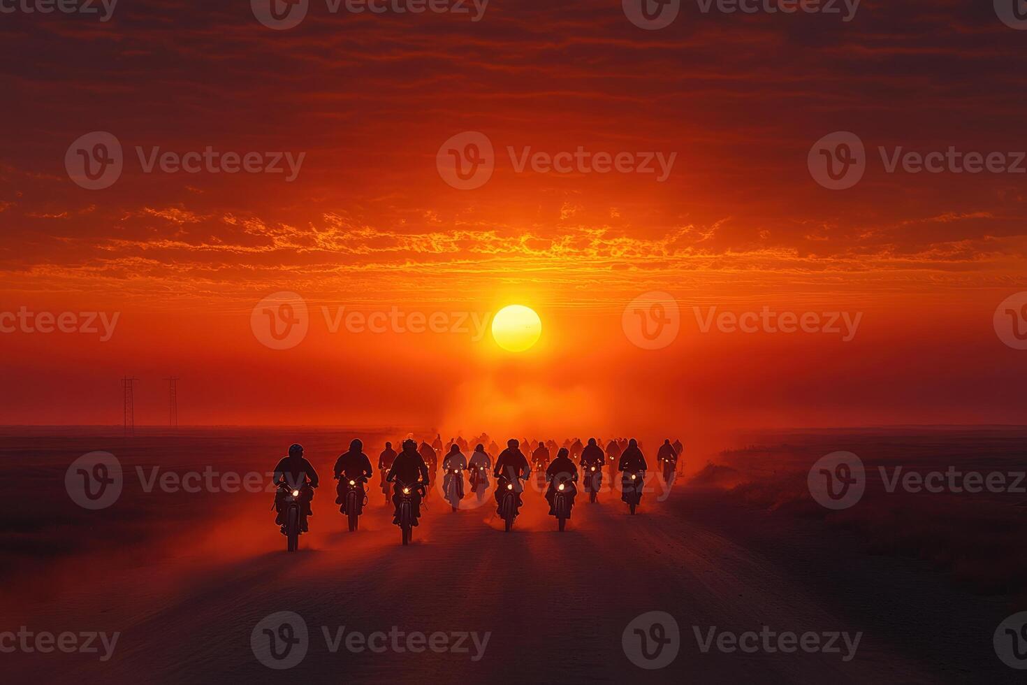 A breathtaking sunset over a vast plain with motorcycles. photo