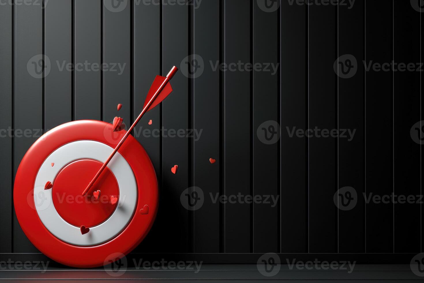 Red target with arrow impact on dark backdrop. photo