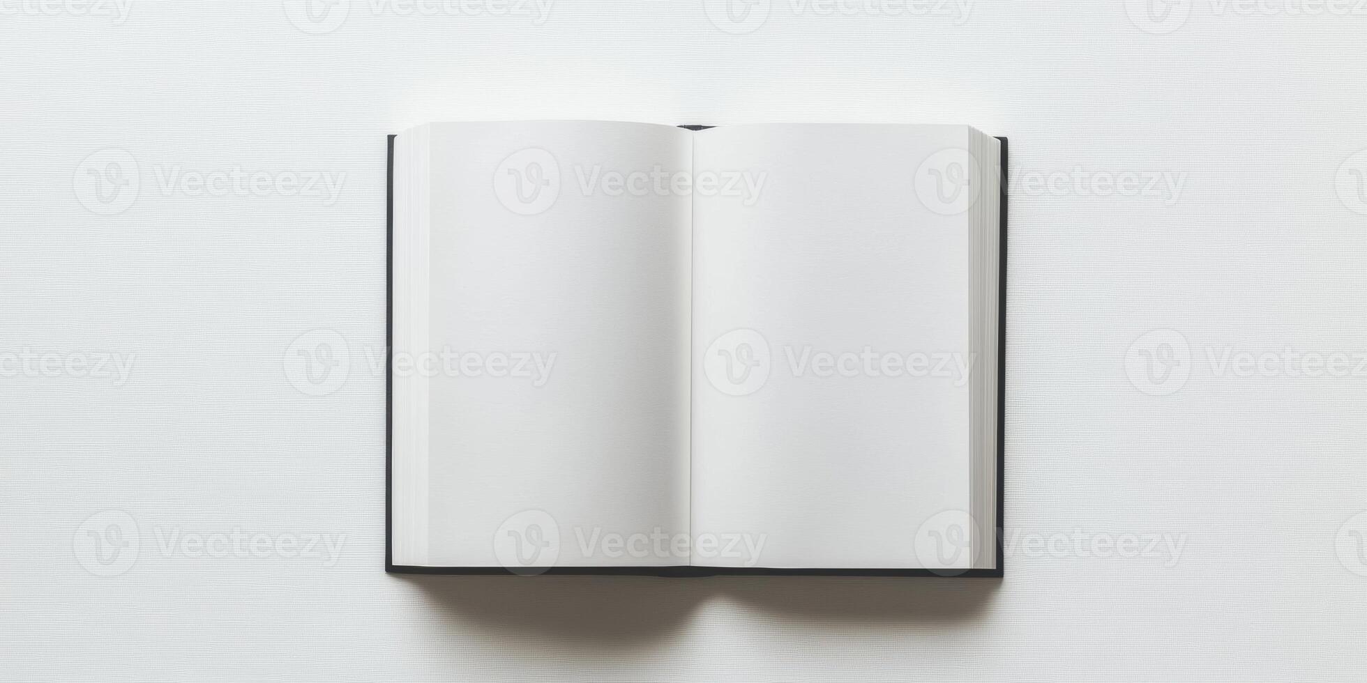 Top view of open blank white book for writing and sketching photo