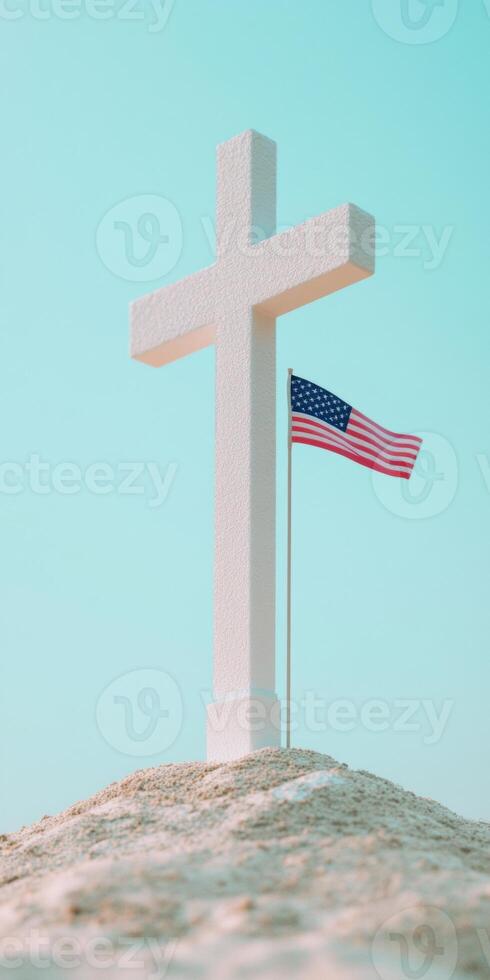 Modern minimalist white cross with American flag on sandy beach photo