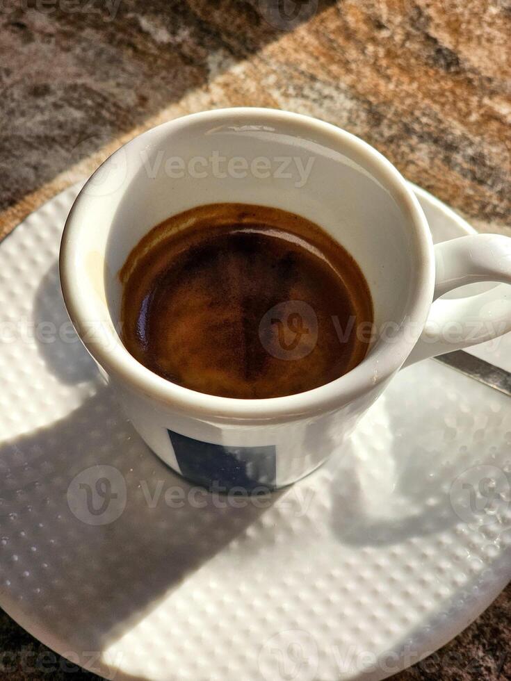 Cup of coffee isolated on the background top view. photo