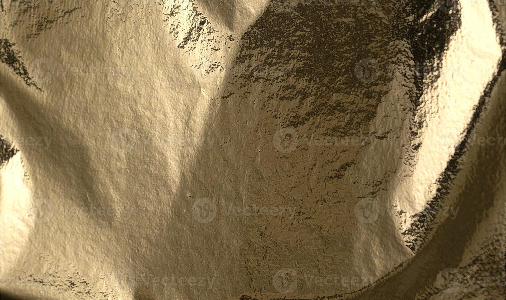 Gold foil texture with smooth, wrinkled metallic surface. Elegant background with soft light, photo
